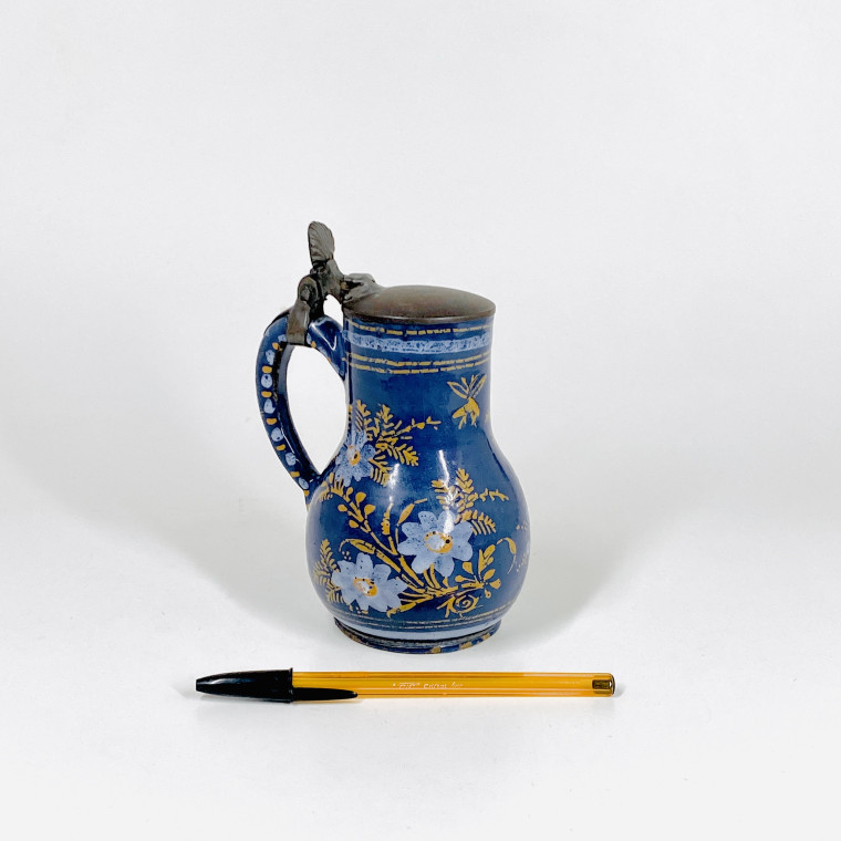 Small Nevers earthenware pitcher with Persian blue background - Seventheenth century