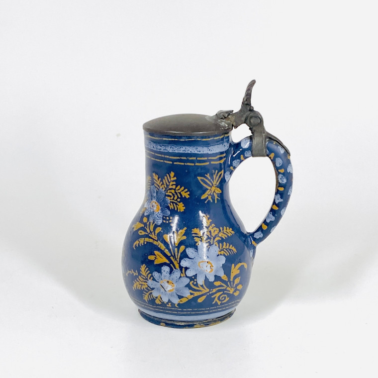 Small Nevers earthenware pitcher with Persian blue background - Seventheenth century