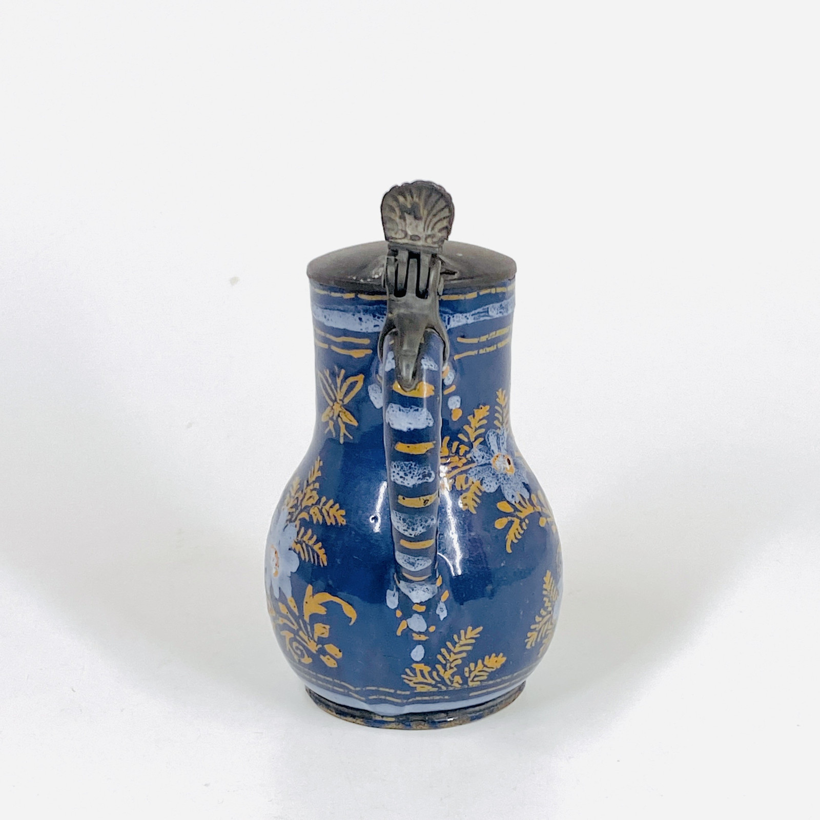 Small Nevers earthenware pitcher with Persian blue background - Seventheenth century