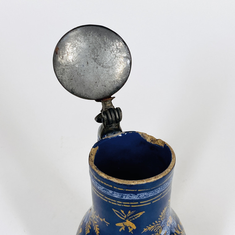 Small Nevers earthenware pitcher with Persian blue background - Seventheenth century