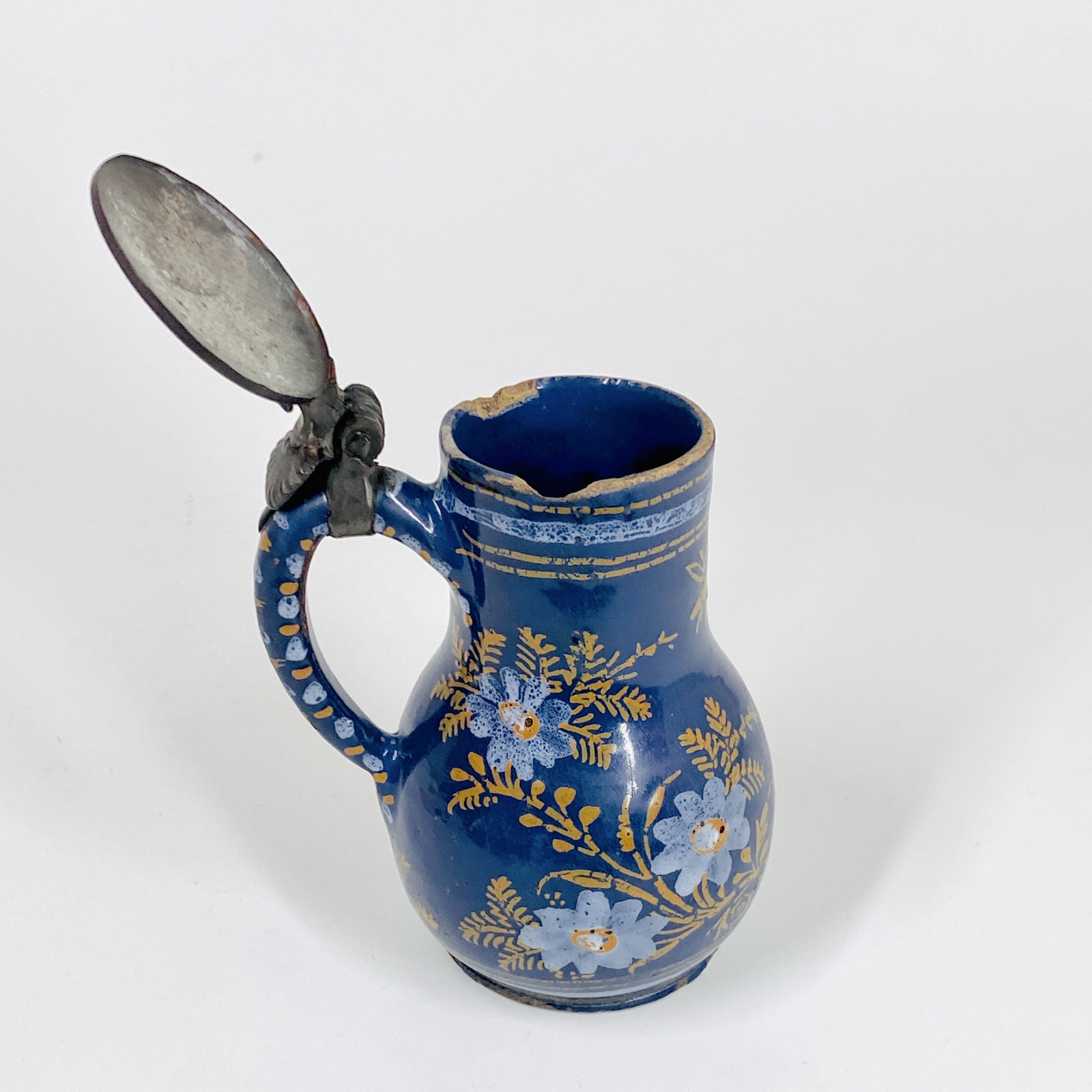 Small Nevers earthenware pitcher with Persian blue background - Seventheenth century