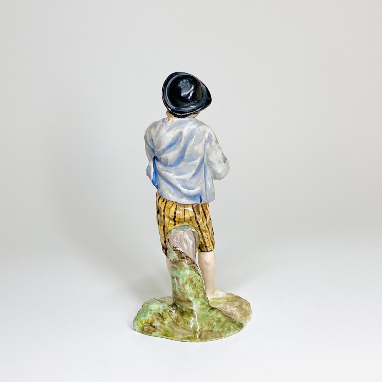 Statuette en faïence de Lunéville représentant un joueur de musette - XVIIIe siècle