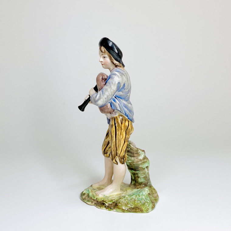 Statuette en faïence de Lunéville représentant un joueur de musette - XVIIIe siècle