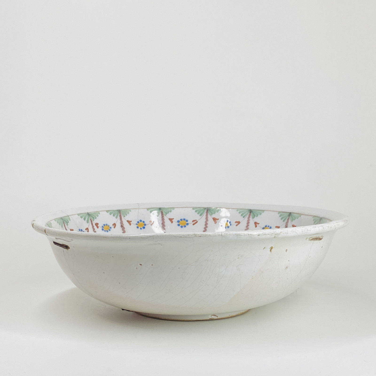 Large earthenware bowl from Roanne with saucy decoration - Eighteenth century