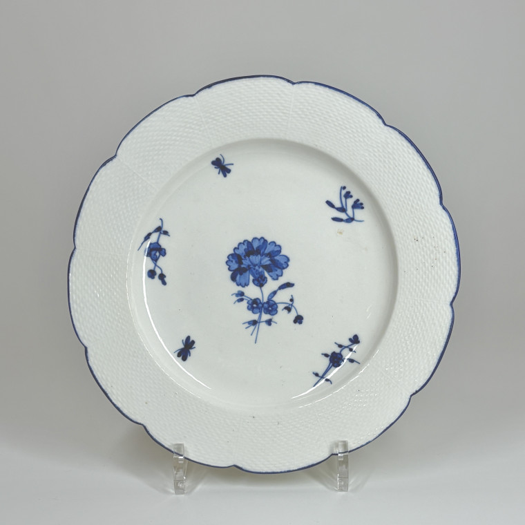 Three Chantilly porcelain plates with a carnation - Eighteenth century