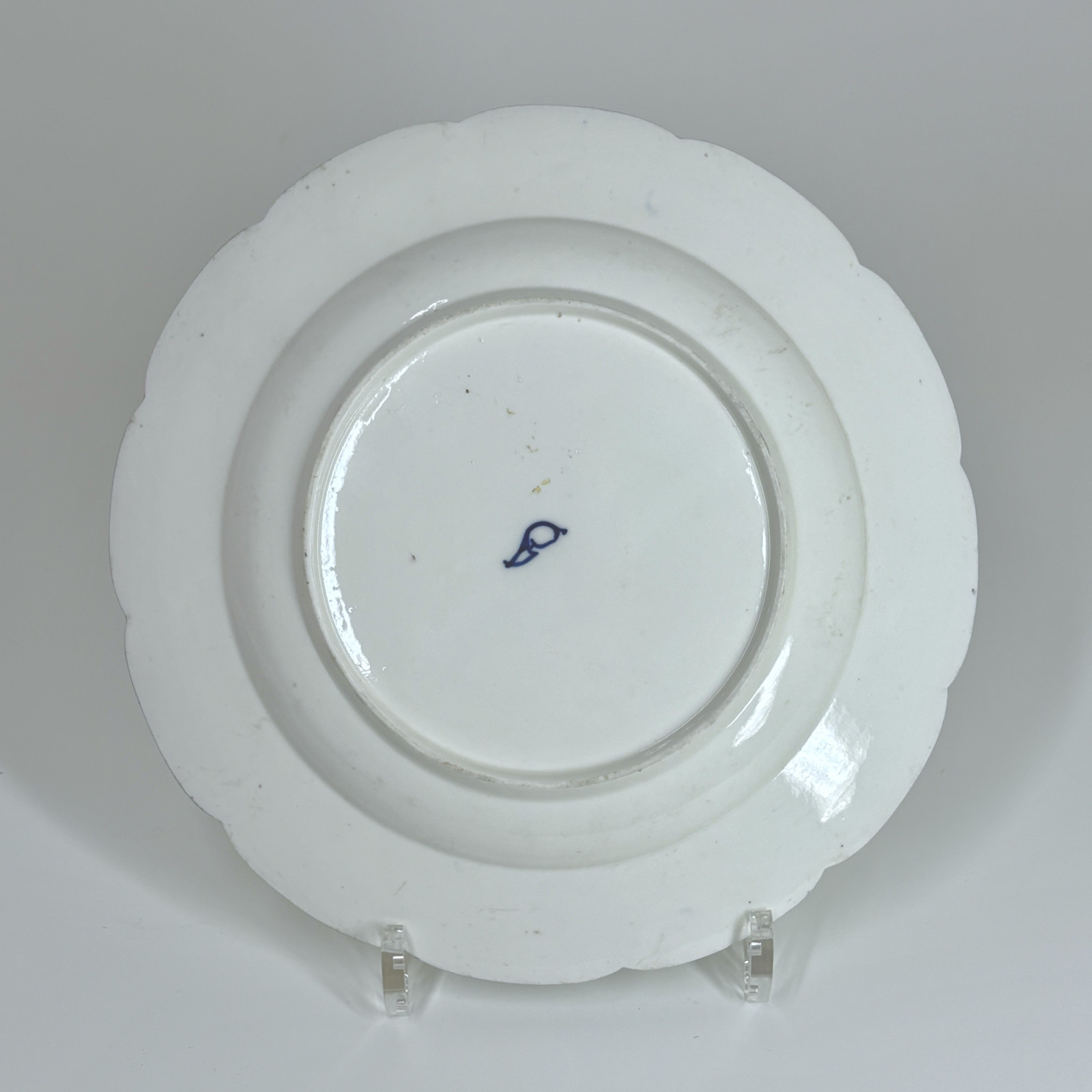Three Chantilly porcelain plates with a carnation - Eighteenth century
