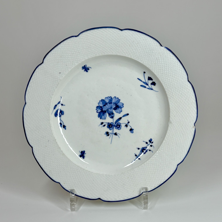 Three Chantilly porcelain plates with a carnation - Eighteenth century