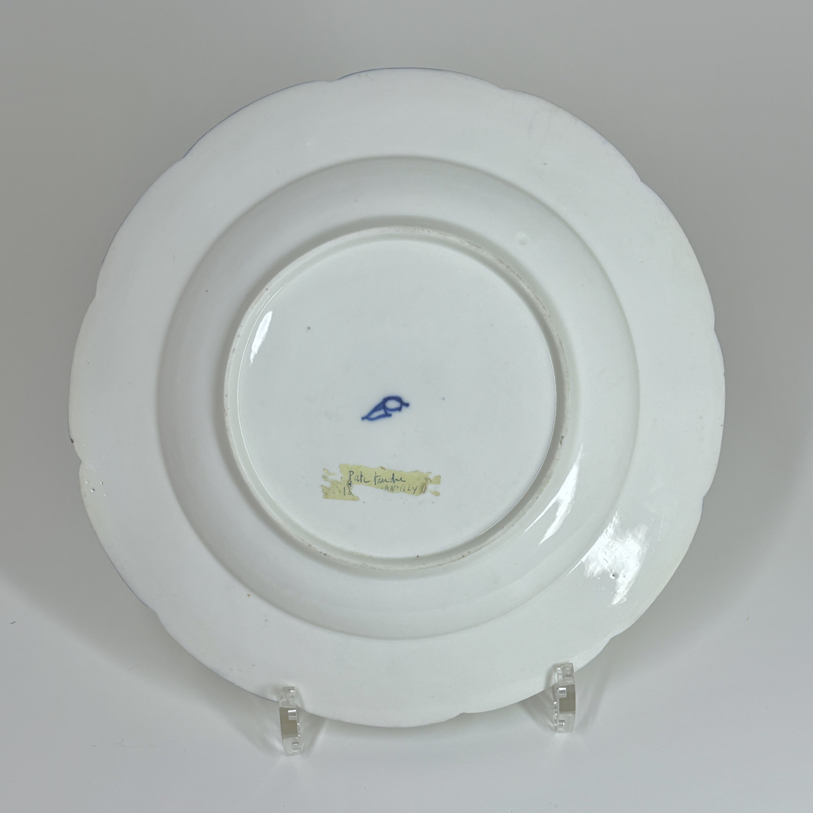 Three Chantilly porcelain plates with a carnation - Eighteenth century