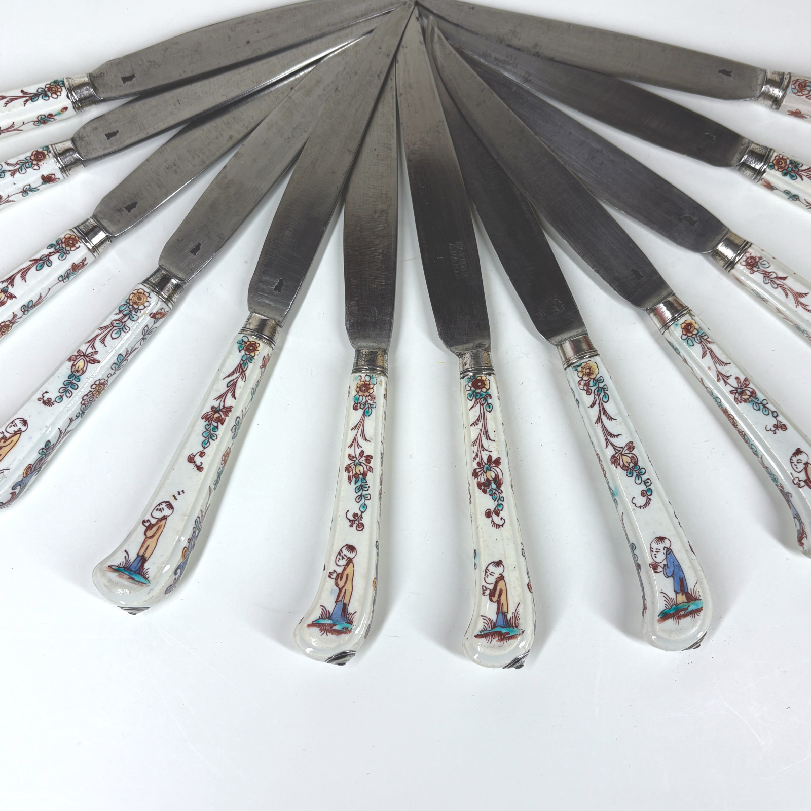 Set of twelve knives with Mennecy porcelain handles - Eighteenth century