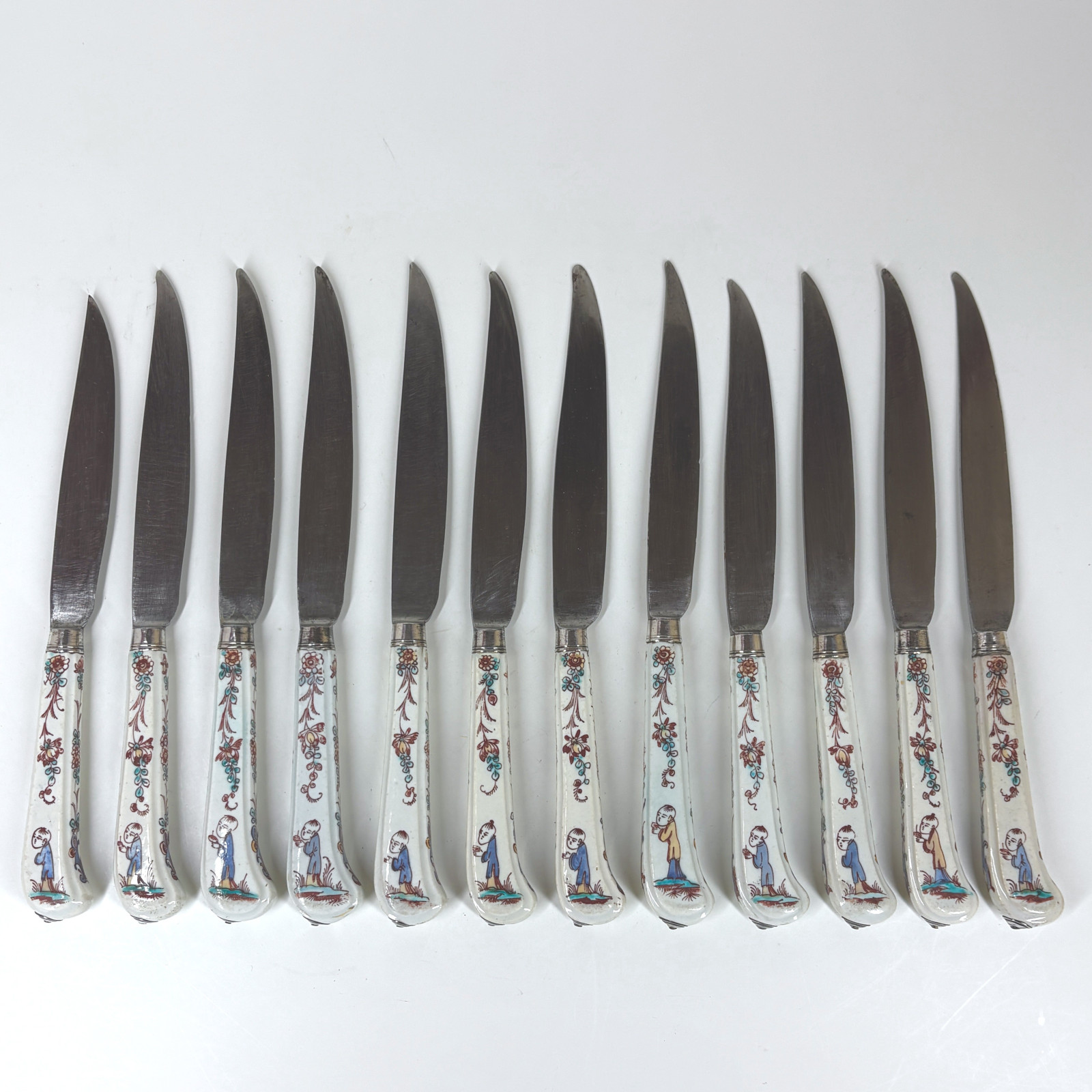 Set of twelve knives with Mennecy porcelain handles - Eighteenth century
