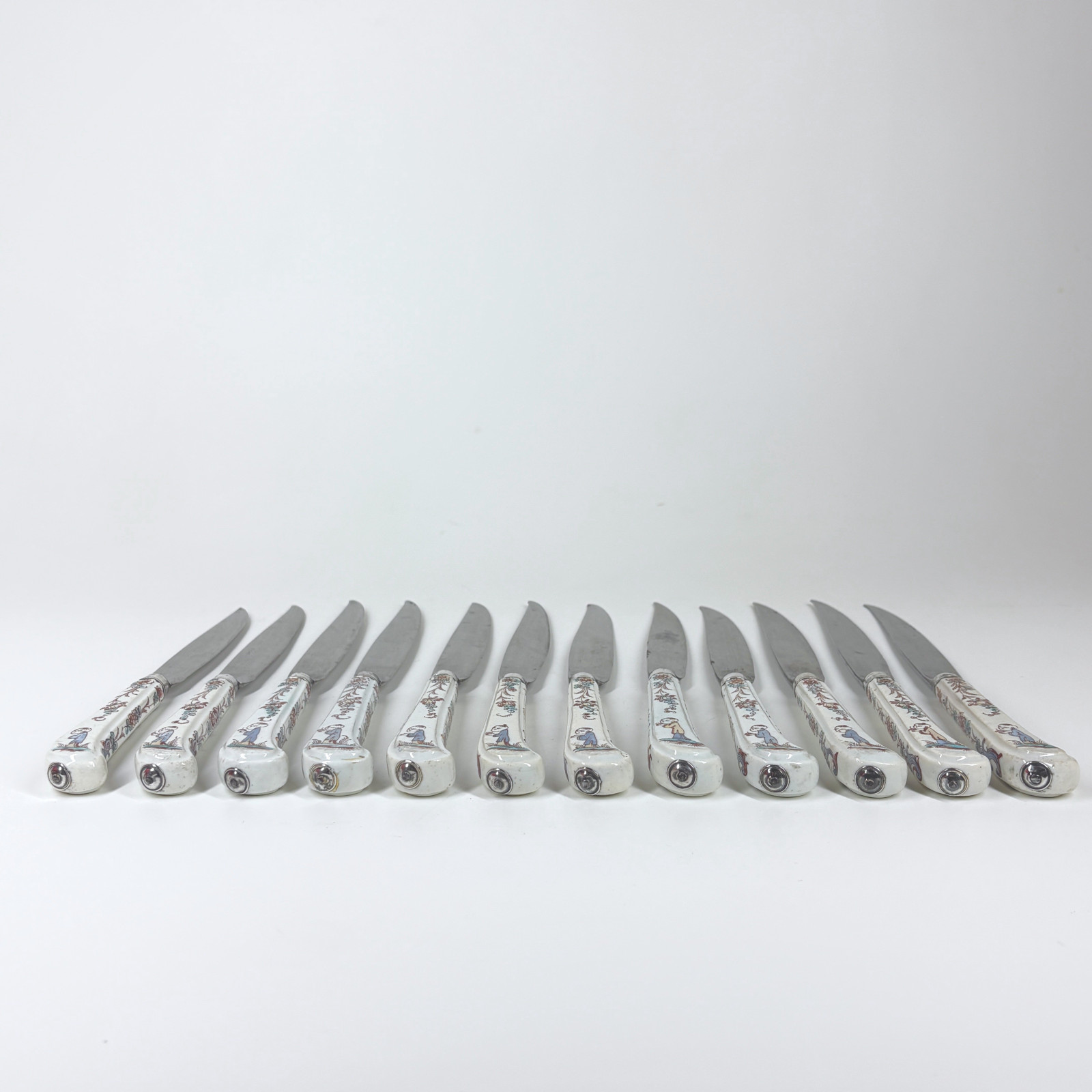 Set of twelve knives with Mennecy porcelain handles - Eighteenth century