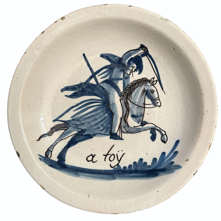 Two earthenware dishes decorated with horsemen from northern France - Eighteenth century