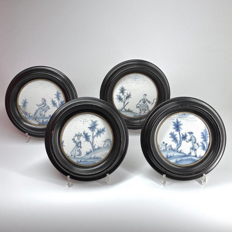 Four earthenware plaques in medallions - 18th century - Sold