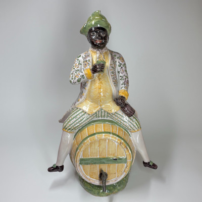Important Bordeaux earthenware fountain depicting a Black man seated on a barrel - 18th century - Sold