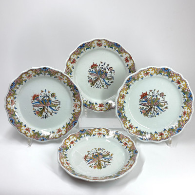 Four Rouen earthenware plates "with quiver" - Eighteenth century