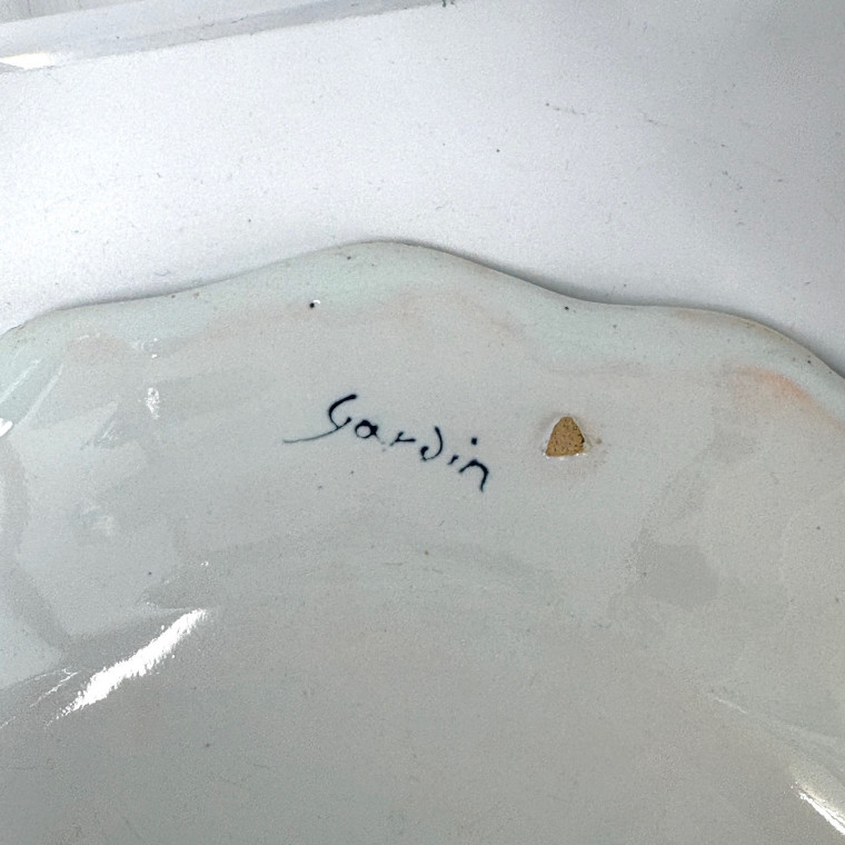 Four Rouen earthenware plates "with quiver" - Eighteenth century