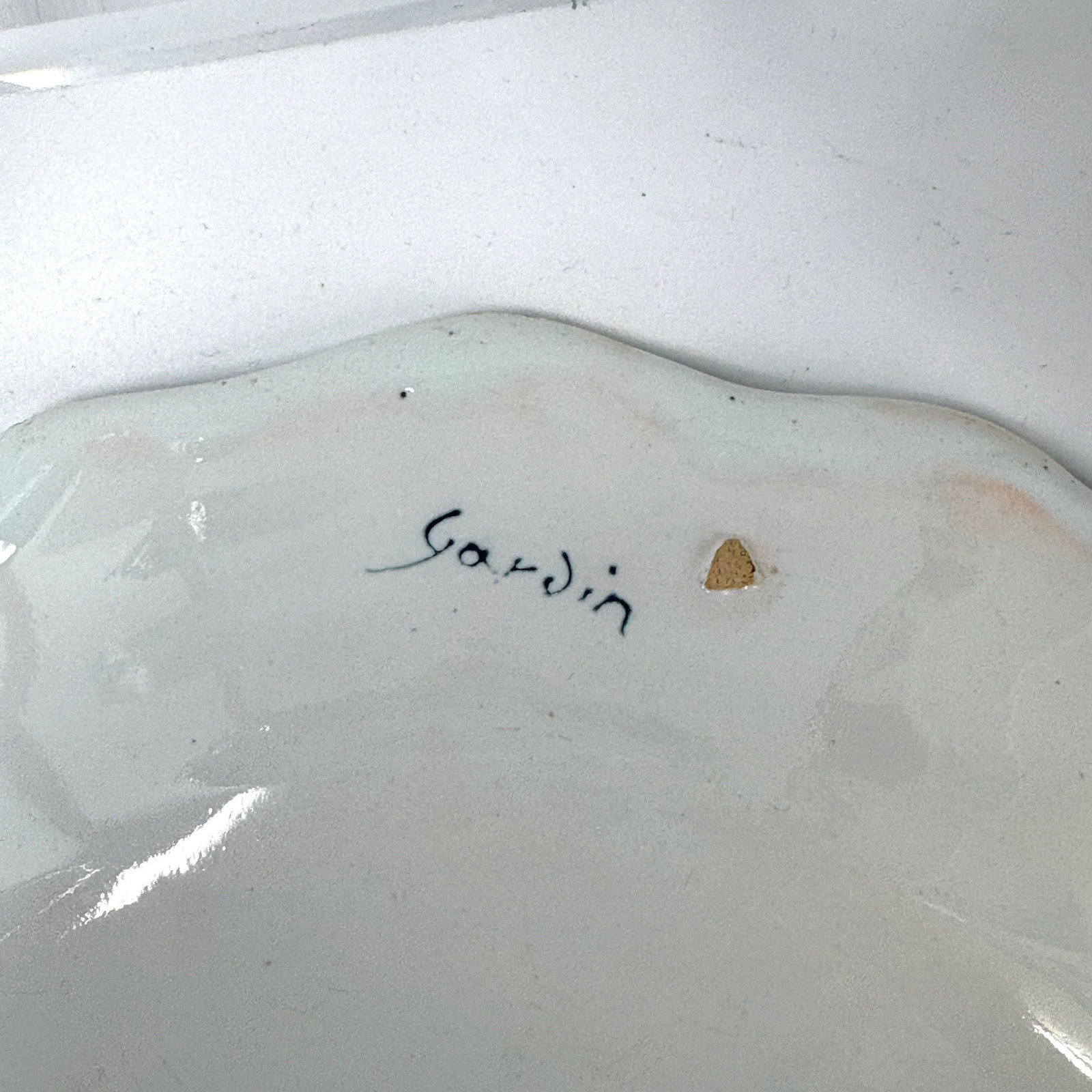 Four Rouen earthenware plates "with quiver" - Eighteenth century