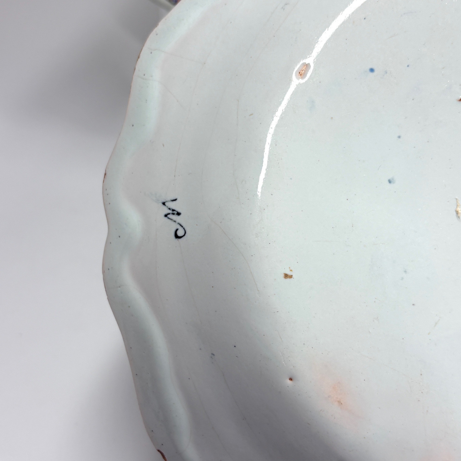 Four Rouen earthenware plates "with quiver" - Eighteenth century