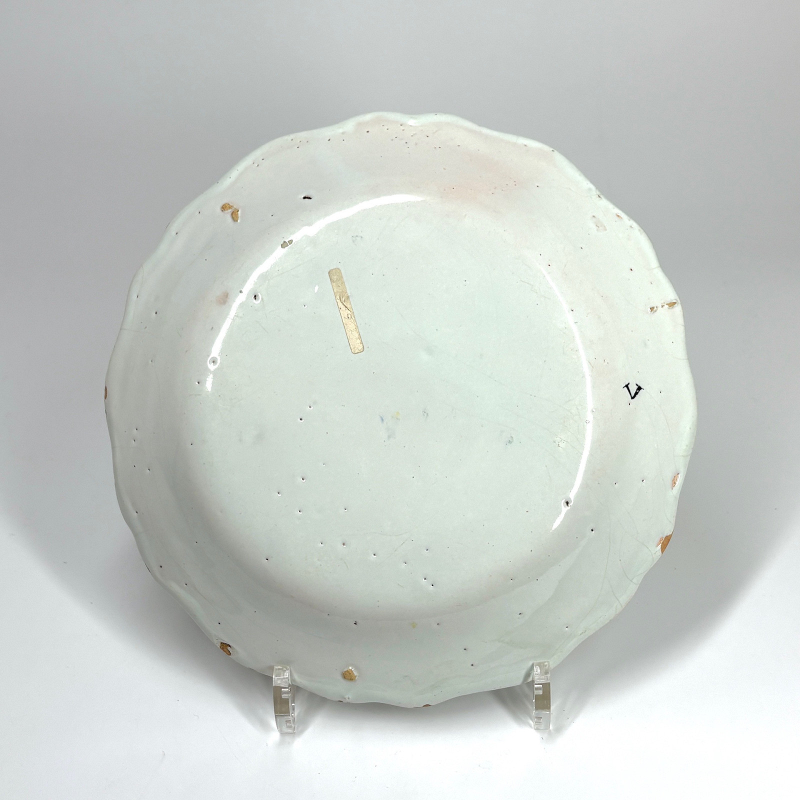 Four Rouen earthenware plates "with quiver" - Eighteenth century