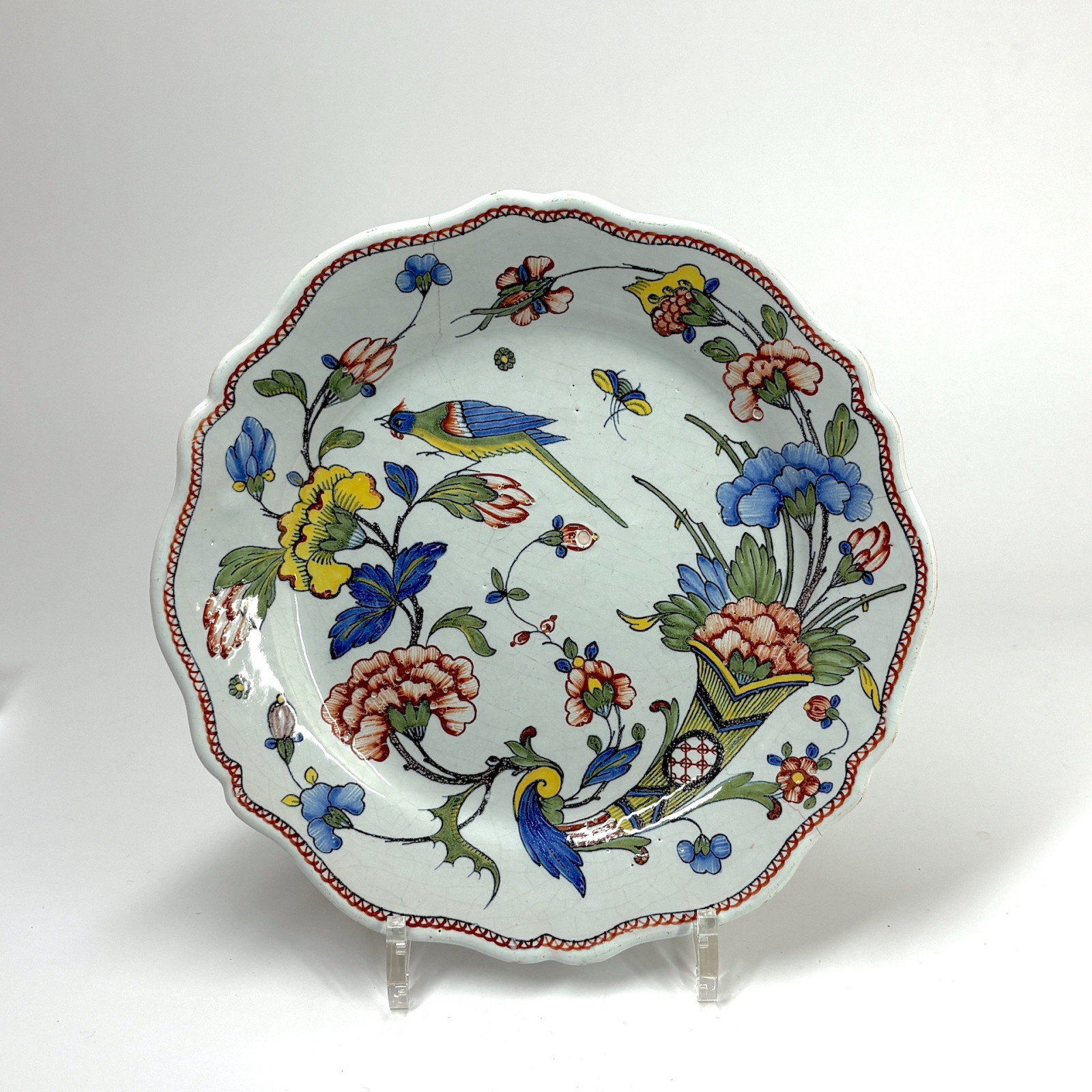 Four Rouen earthenware plates "with quiver" - Eighteenth century