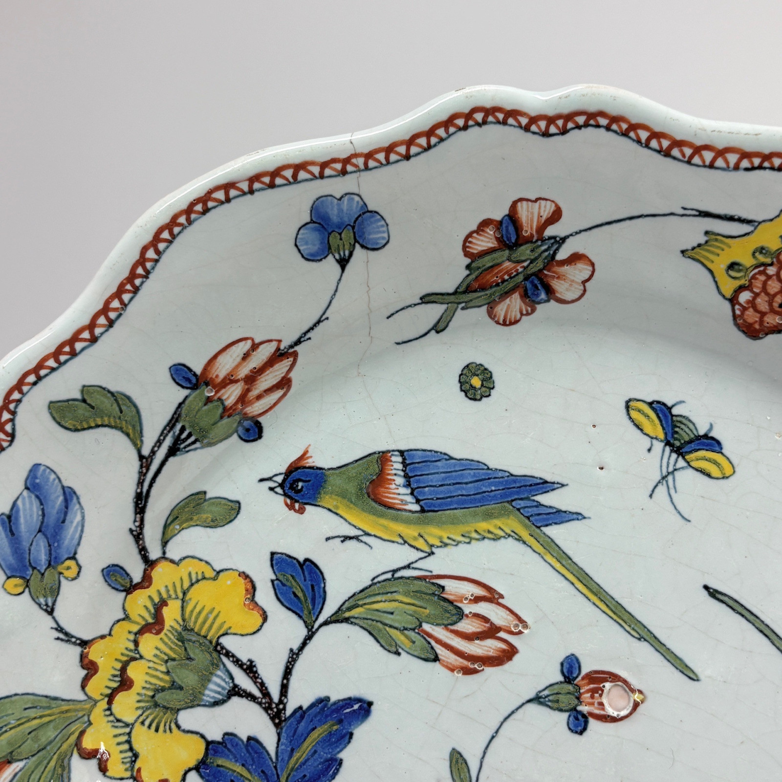 Four Rouen earthenware plates "with quiver" - Eighteenth century