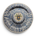 Grand plat à ombilic en faïence de Savone - XVIle siècle