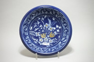 NEVERS. Round bowl with Persian blue background - seventeenth century