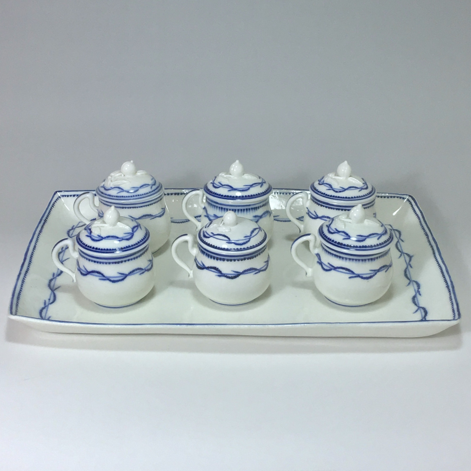 Arras - soft porcelain - Tray and five cream pots - eighteenth century