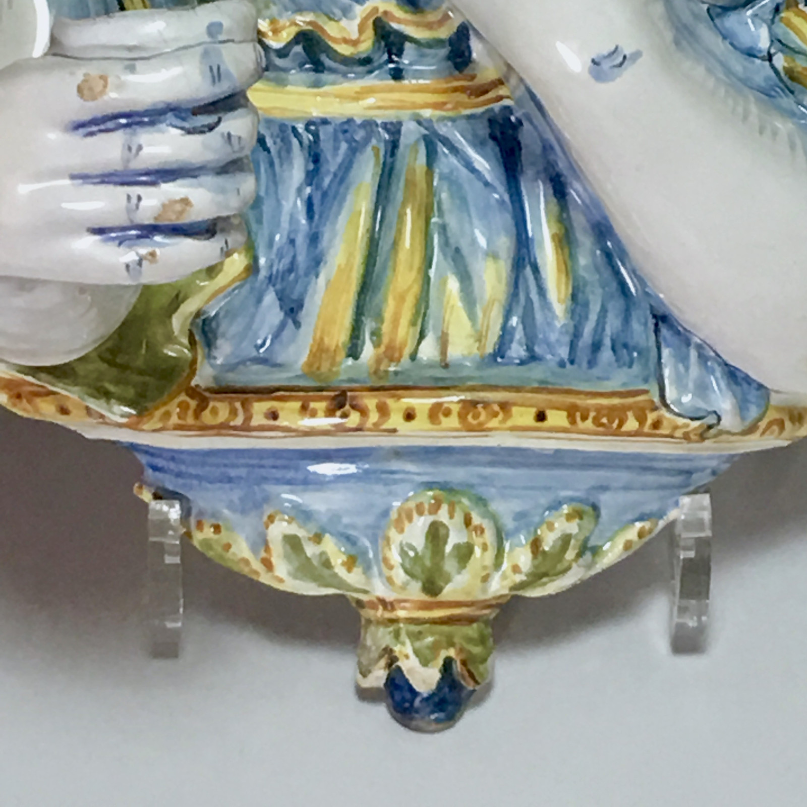 Nevers earthenware of the seventeenth century - plate forming an arm holding a candle
