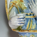 Nevers earthenware of the seventeenth century - plate forming an arm holding a candle