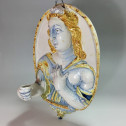 Nevers earthenware of the seventeenth century - plate forming an arm holding a candle