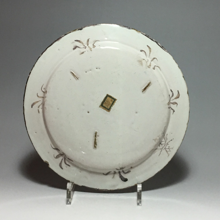 Pavia - Small dish decorated with ruins on a landscape background - Late 17th - Early 18th century