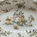 LYON - Dish decorated with putti - eighteenth century - SOLD