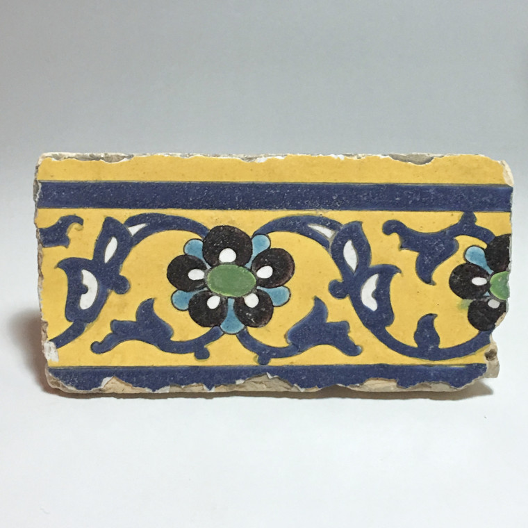 Two polychrome floral decoration tiles in style "cuerda seca" - Iran - Safavid Art - Seventeenth century.