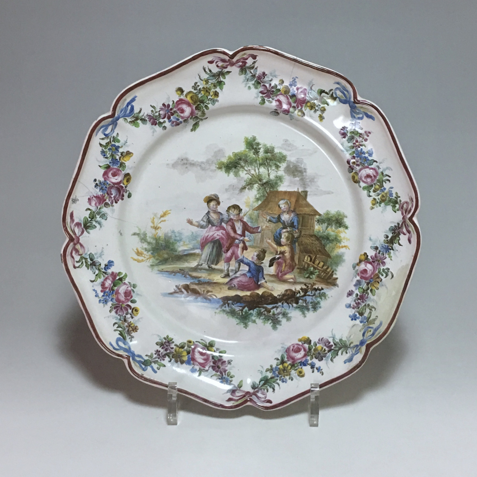 Meillonnas - Children's play plate with mason whip - eighteenth century - SOLD