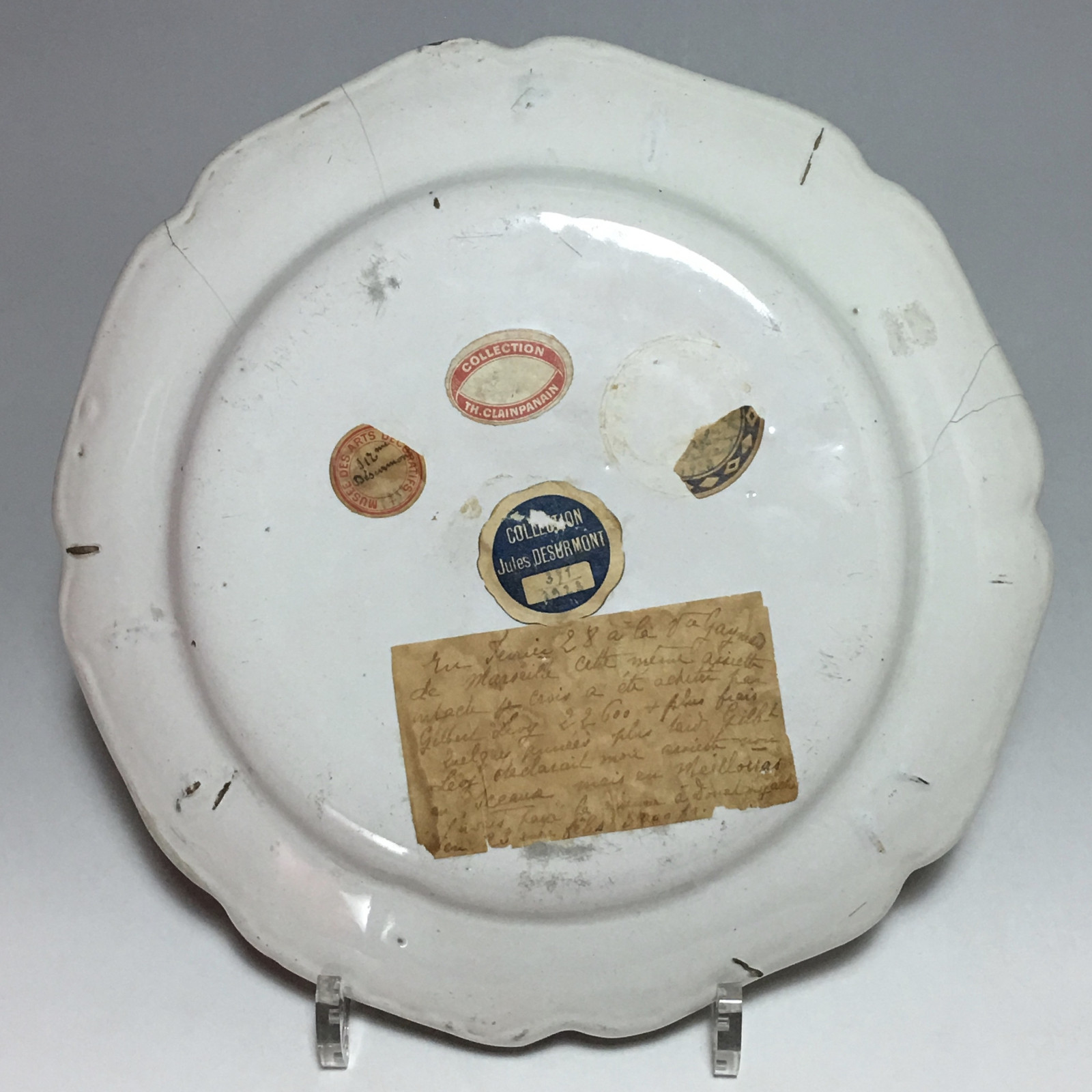 Meillonnas - Children's play plate with mason whip - eighteenth century - SOLD