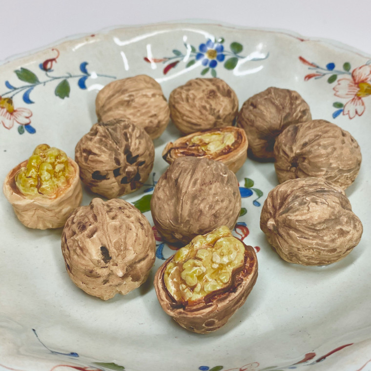 Rouen or Sinceny - Deep plate decorated with trompe l'oeil nuts - Eighteenth century