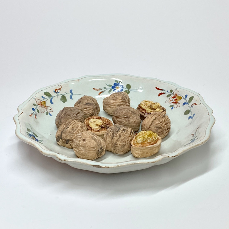 Rouen or Sinceny - Deep plate decorated with trompe l'oeil nuts - Eighteenth century