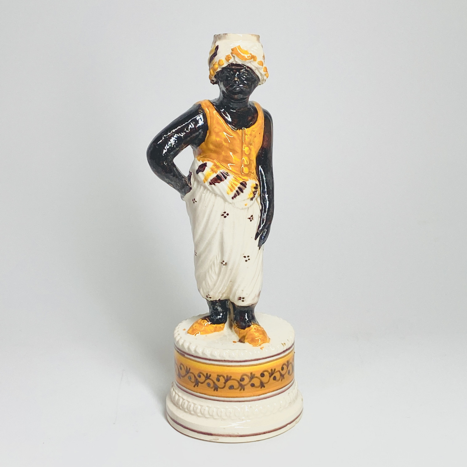Fine earthenware candlestick depicting a Moor - Nineteenth century