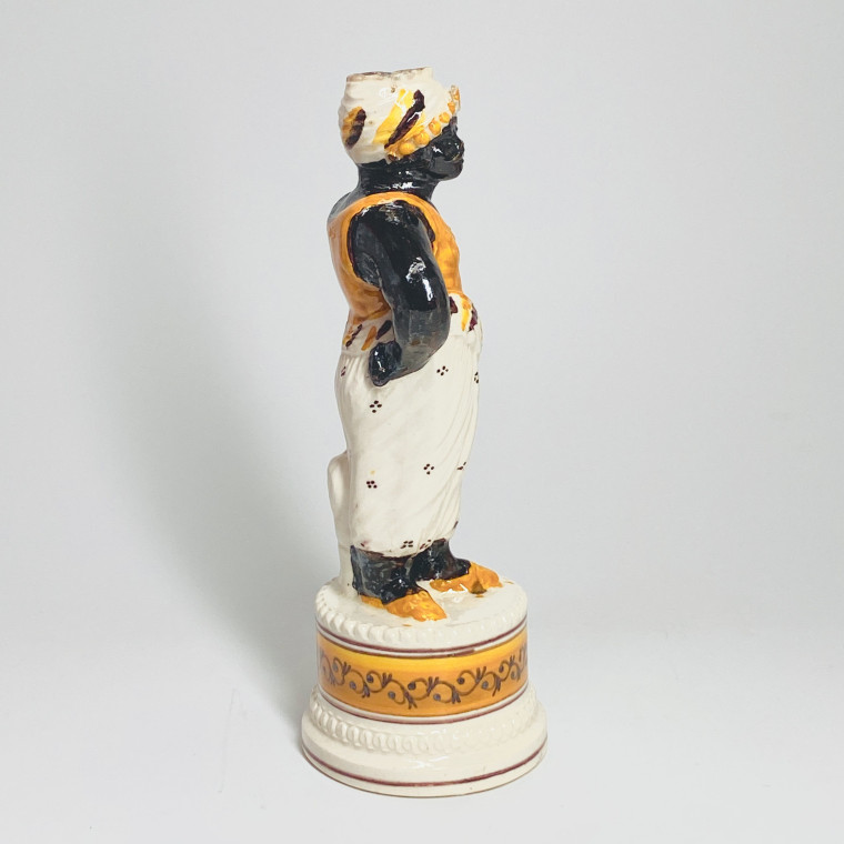 Fine earthenware candlestick depicting a Moor - Nineteenth century