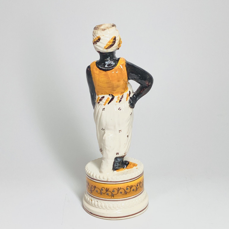 Fine earthenware candlestick depicting a Moor - Nineteenth century