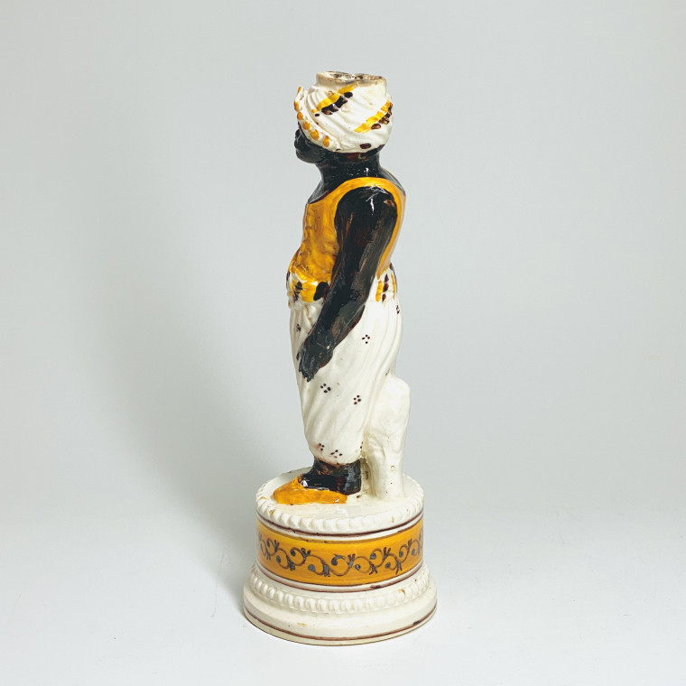 Fine earthenware candlestick depicting a Moor - Nineteenth century