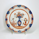 Delft - Assiette en faïence à décor dit " Delft doré " - Début du XVIIIe siècle