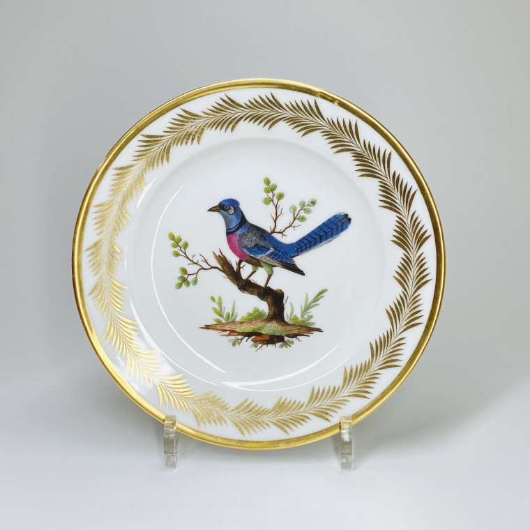 Paris (Nast) - Six assiettes en porcelaine à décor d'oiseaux - Début du XIXe siècle