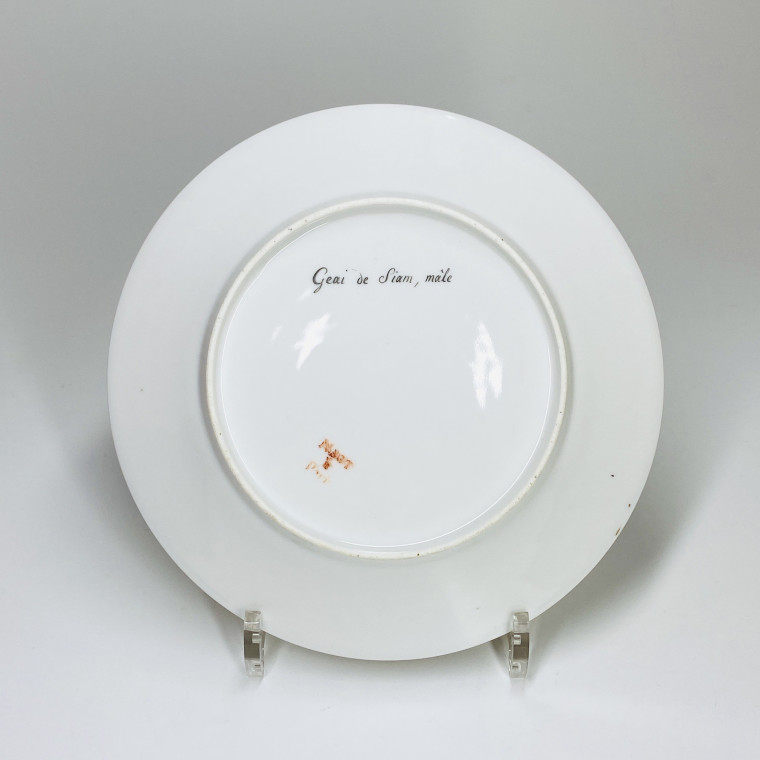 Paris (Nast) - Six assiettes en porcelaine à décor d'oiseaux - Début du XIXe siècle