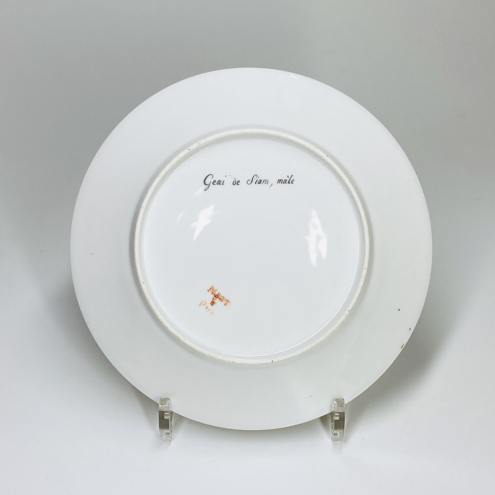 Paris (Nast) - Six assiettes en porcelaine à décor d'oiseaux - Début du XIXe siècle