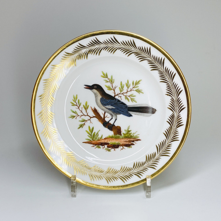 Paris (Nast) - Six assiettes en porcelaine à décor d'oiseaux - Début du XIXe siècle