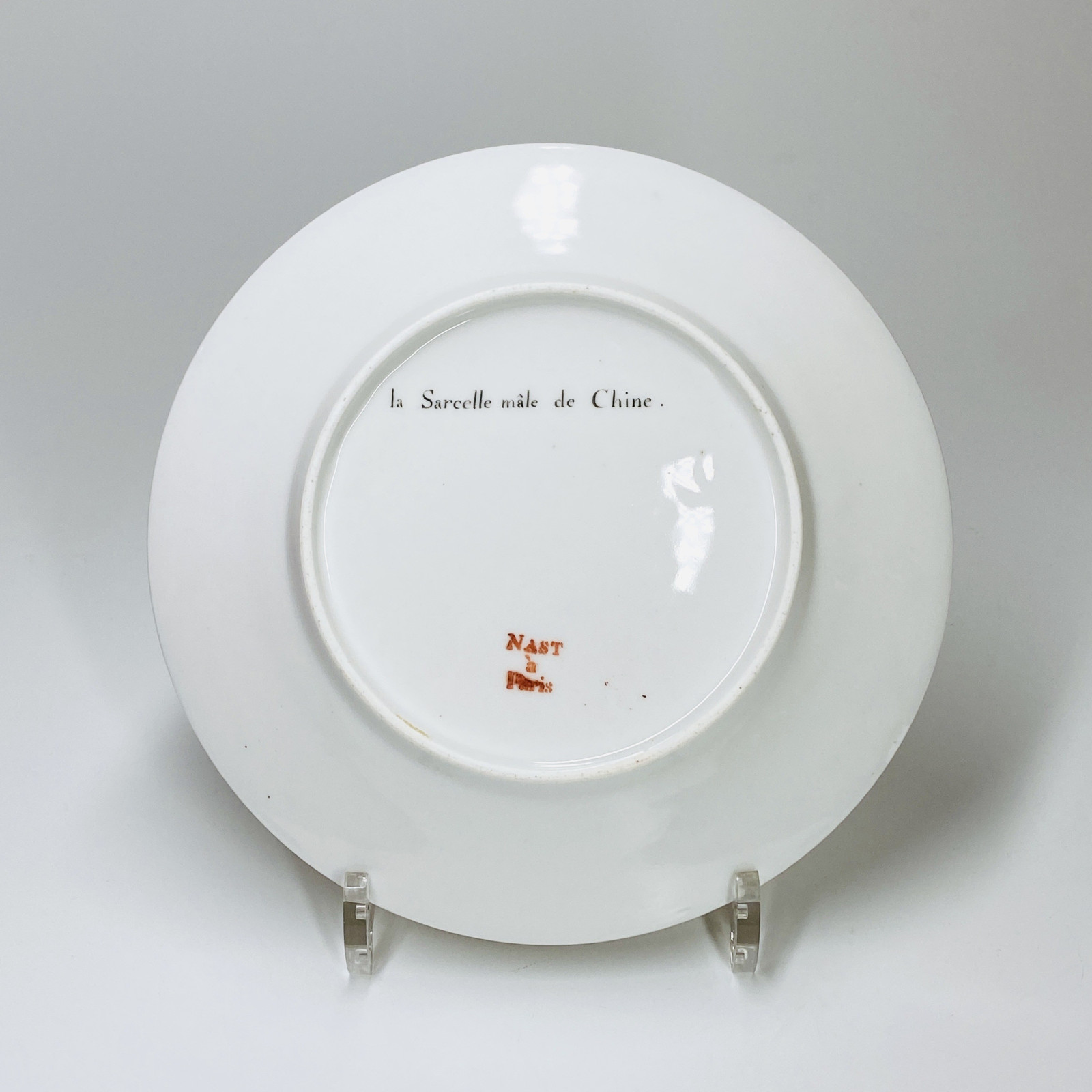 Paris (Nast) - Six assiettes en porcelaine à décor d'oiseaux - Début du XIXe siècle