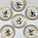 Paris (Nast) - Six assiettes en porcelaine à décor d'oiseaux - Début du XIXe siècle