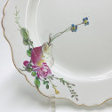 Marseille (Robert) Assiette à décor de fleurs et fruit - XVIIIe siècle